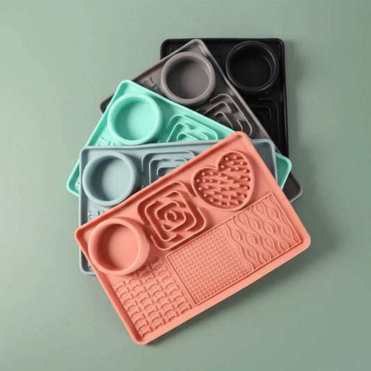 Peach Pink interactive dog licking mat with suction cups, perfect for spreading peanut butter or yogurt.