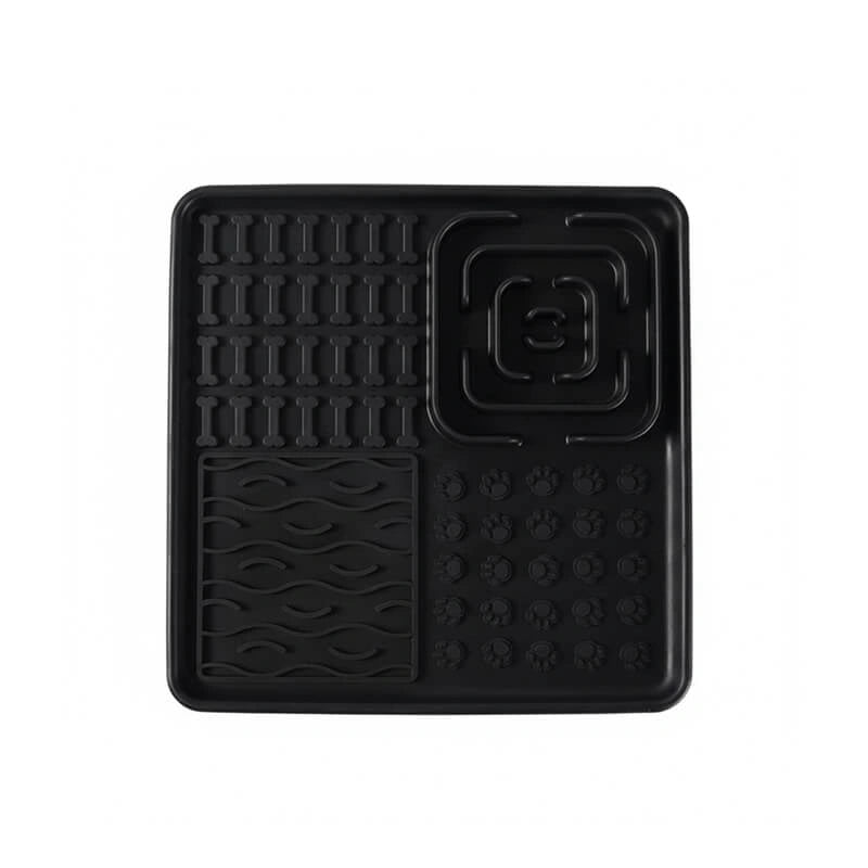 Black durable lick mat for dogs, featuring raised paw and wave prints for extended, engaging mealtimes.