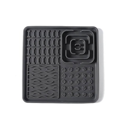 Gray slow feeder lick mat with a seamless surface, designed for effortless cleaning and dishwasher safety.