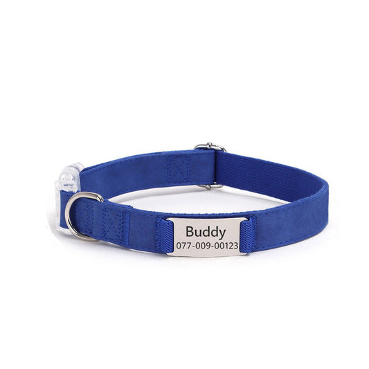 Personalized leather dog collar with engraved ID tag and adjustable buckle in blue